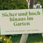 Person steigt sicher eine Aluminium-Stehleiter im Garten hinauf